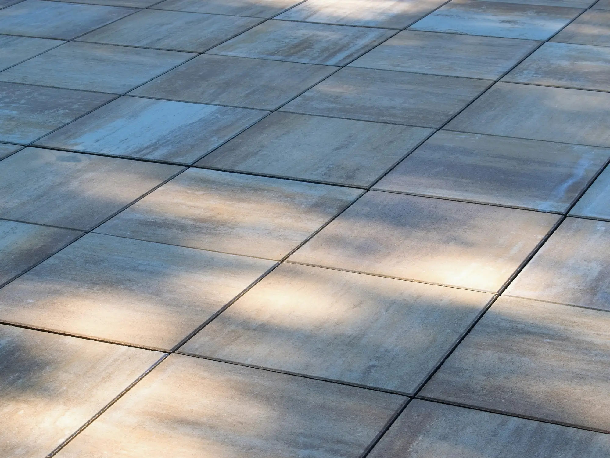 Porcelain deck pavers installed over a patio near Federal Way, WA