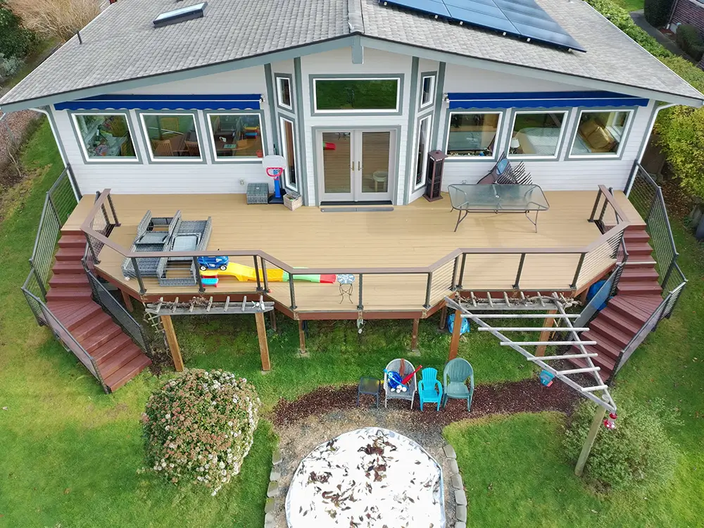 Porcelain Pavers vs. Wood Decking on a Tacoma Rooftop: A Real Project Cost and Performance Comparison
